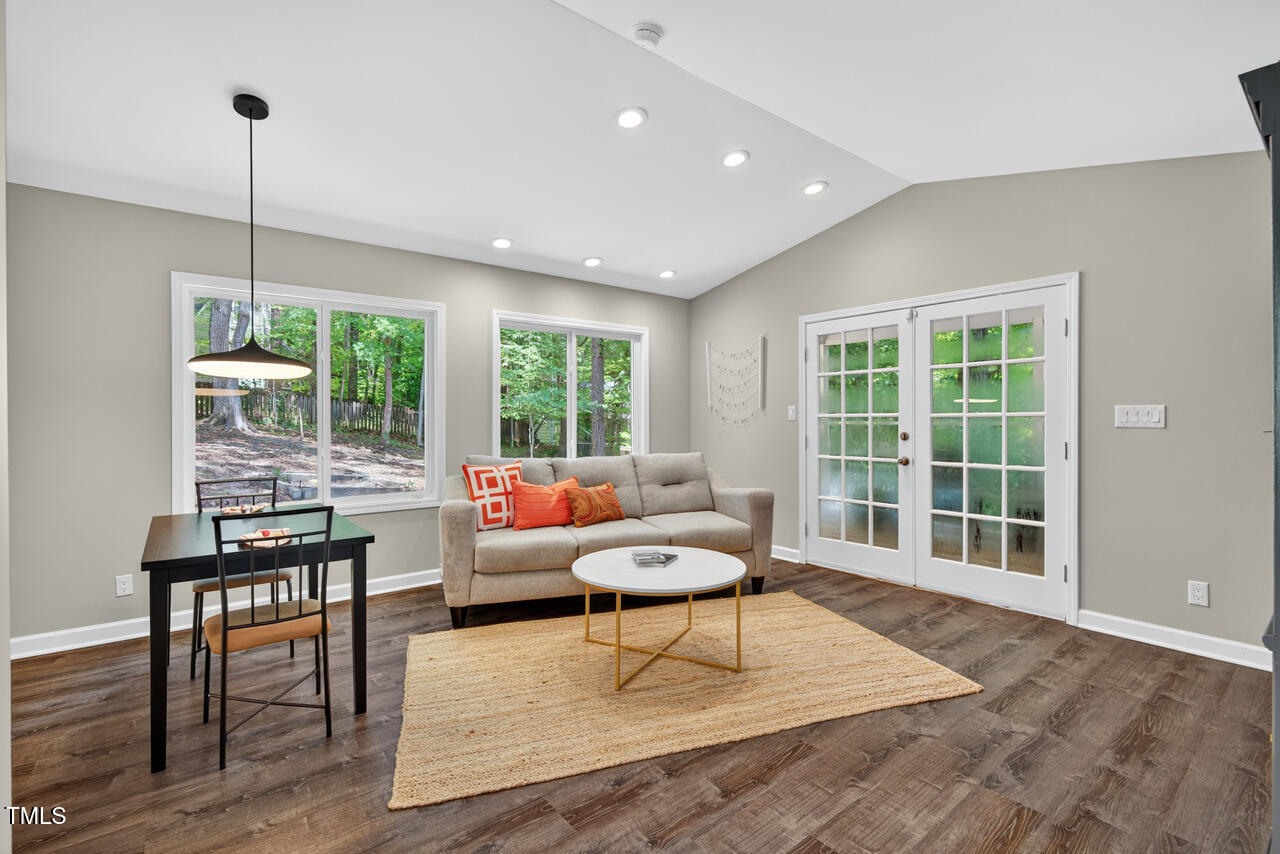 1500 Valley Run Durham, NC 27707 - Photo 10 of 29 a living room with a large window and furniture