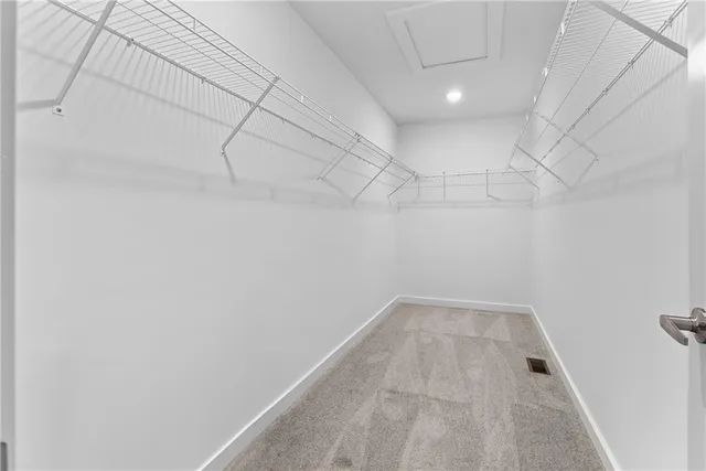 a view of a room with racks on the wall