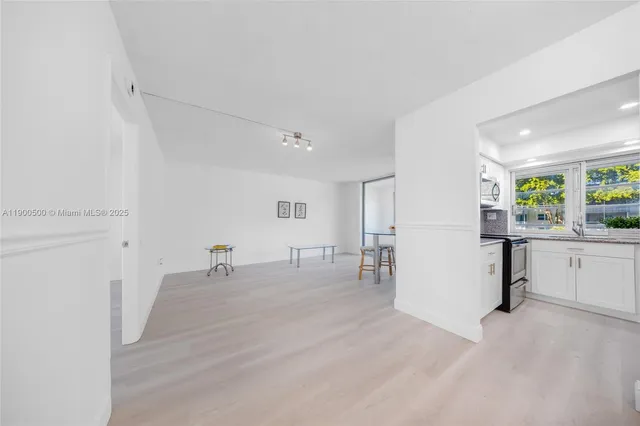 a room with furniture and window