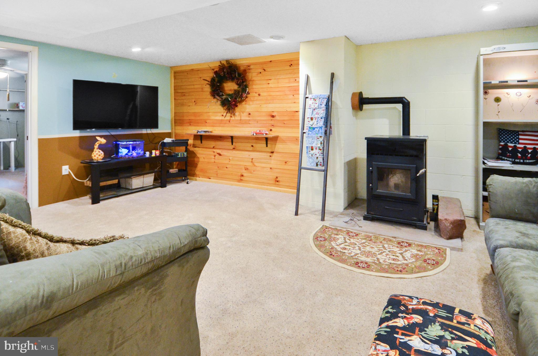 929 Federal Hill Road Street, MD 21154 - Photo 17 of 26 Cozy pellet stove in family room
