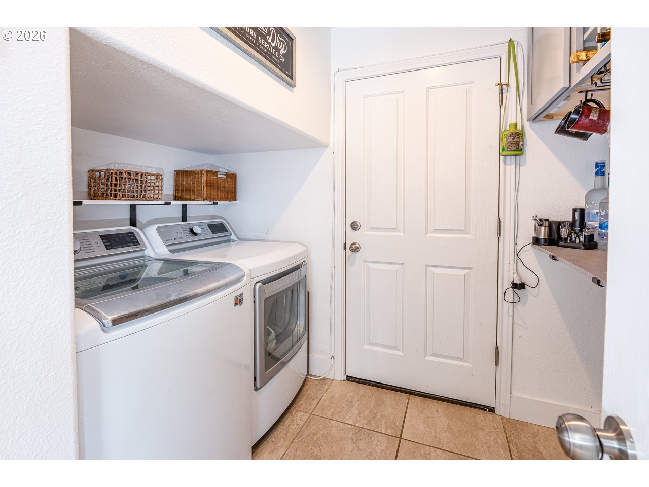 38 Denmark Loop Silverton, OR 97381 - Photo 14 of 47 a utility room with dryer and washer