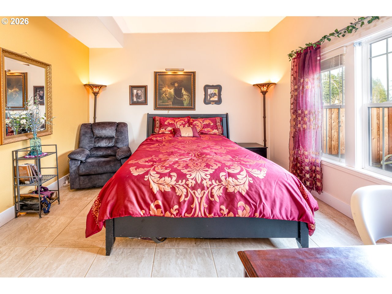 38 Denmark Loop Silverton, OR 97381 - Photo 18 of 47 a bedroom with a bed and wooden floor