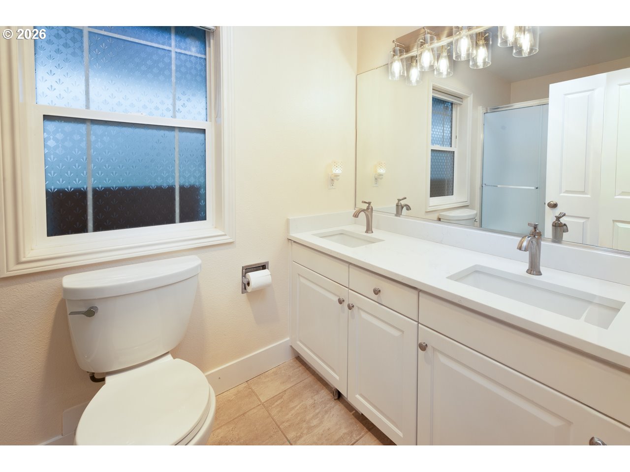 38 Denmark Loop Silverton, OR 97381 - Photo 20 of 47 a bathroom with a toilet sink and mirror