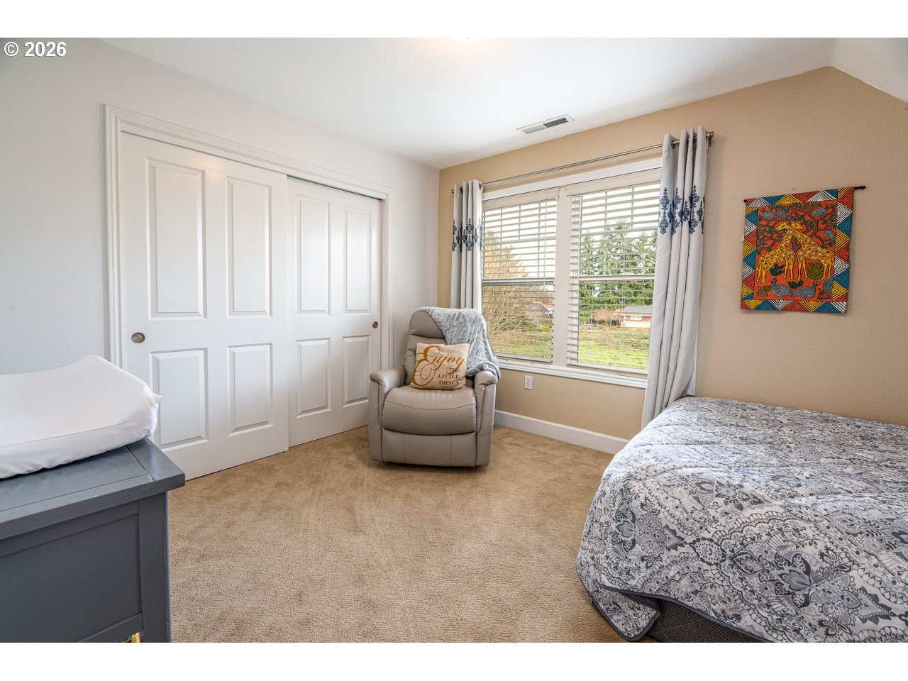 38 Denmark Loop Silverton, OR 97381 - Photo 26 of 47 a bedroom with a bed and a couch