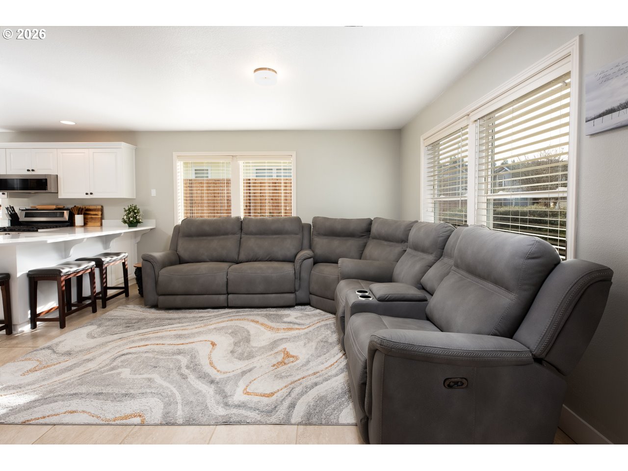 38 Denmark Loop Silverton, OR 97381 - Photo 9 of 47 a living room with furniture and a large window