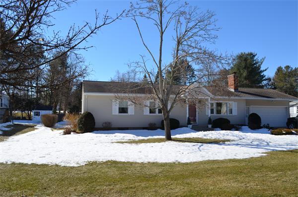 371 Wolf Swamp Road Longmeadow, MA 01106 - Photo 1 of 18 a view of a white house with a snow yard