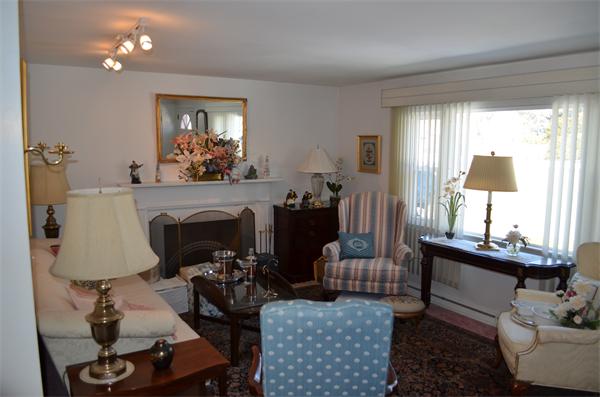 371 Wolf Swamp Road Longmeadow, MA 01106 - Photo 11 of 18 a living room with furniture and a fireplace