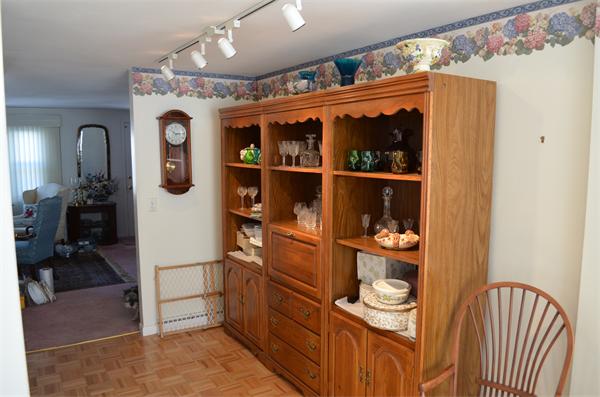 371 Wolf Swamp Road Longmeadow, MA 01106 - Photo 8 of 18 a view of a room with rack and furniture