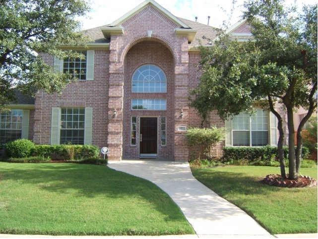 622 Olympic Richardson, TX 75081 - Photo 1 of 1 a front view of a house with a garden