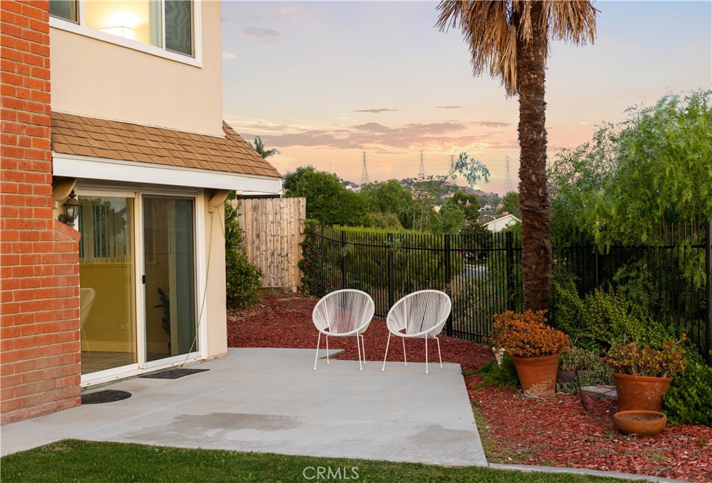 2810 East Echo Hill Way Orange, CA 92867 - Photo 12 of 49 a backyard of a house with garden and outdoor seating