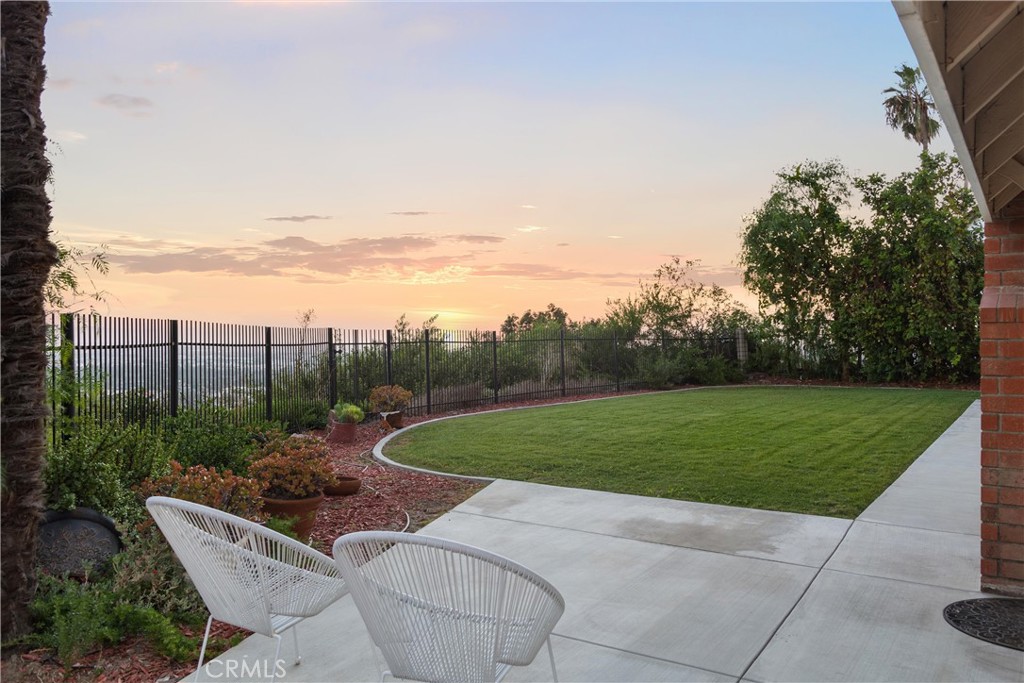 2810 East Echo Hill Way Orange, CA 92867 - Photo 13 of 49 sliding doors lead to large flat grassy yard with epic views