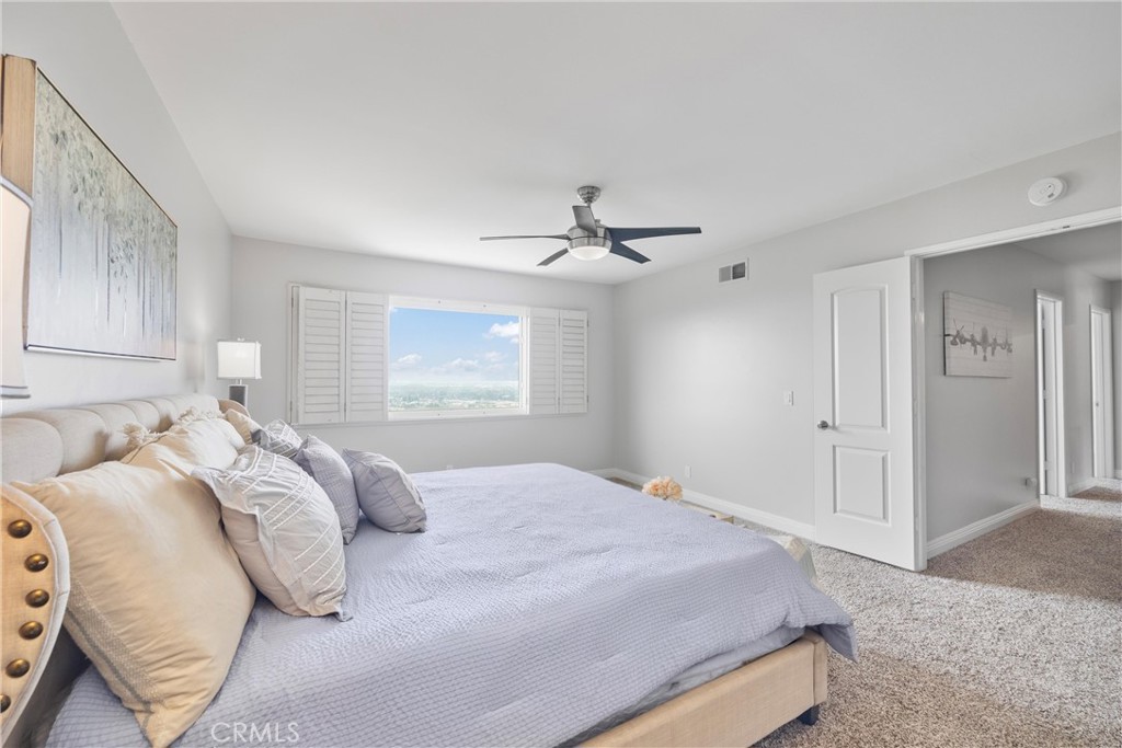 2810 East Echo Hill Way Orange, CA 92867 - Photo 30 of 49 a bedroom with a bed and a window