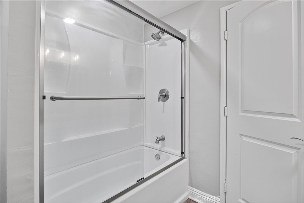 2810 East Echo Hill Way Orange, CA 92867 - Photo 39 of 49 a bathroom with a bathtub and a shower