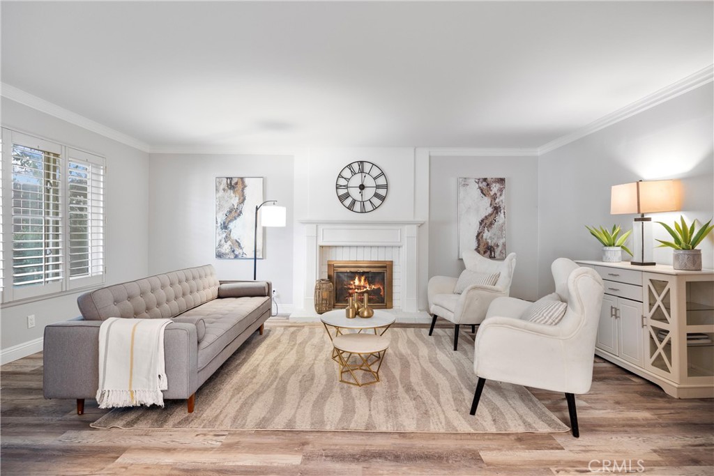 2810 East Echo Hill Way Orange, CA 92867 - Photo 6 of 49 a living room with furniture and a fireplace