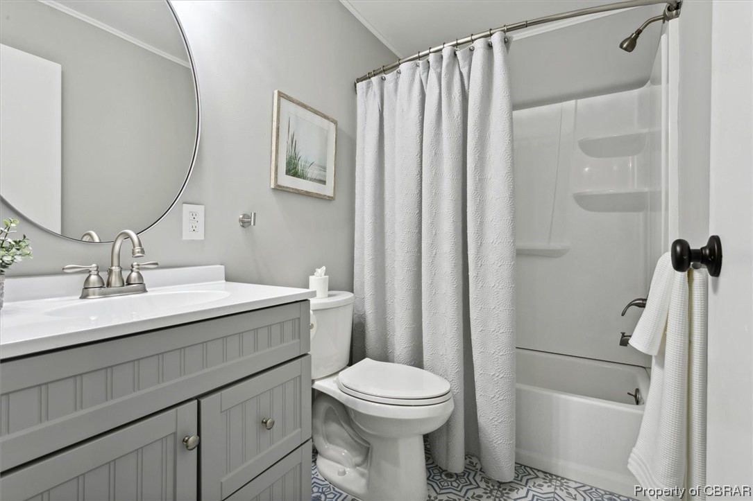 8636 Diascund Road Lanexa, VA 23089 - Photo 39 of 50 Full bathroom featuring light tile floors, oversized vanity, mirror, and shower / bath combo