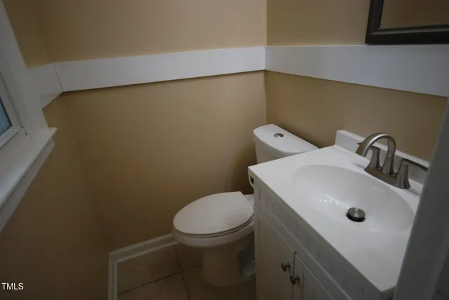 a bathroom with a sink toilet and bathtub