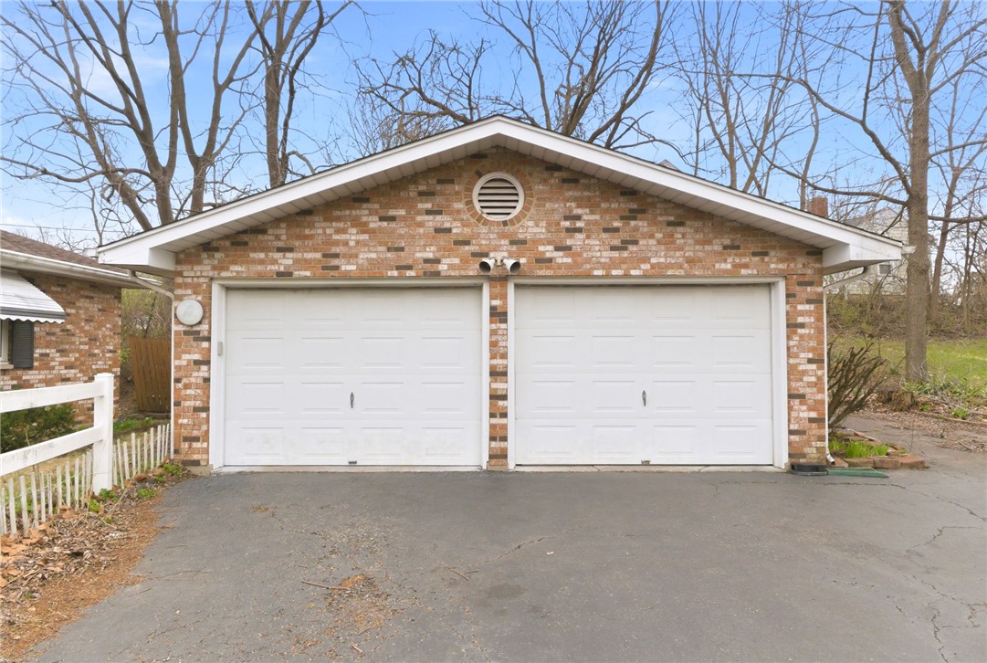6711 Hamilton-Middletown Road Franklin, OH 45005 - Photo 33 of 49 This classic brick garage offers convenient and secure parking.