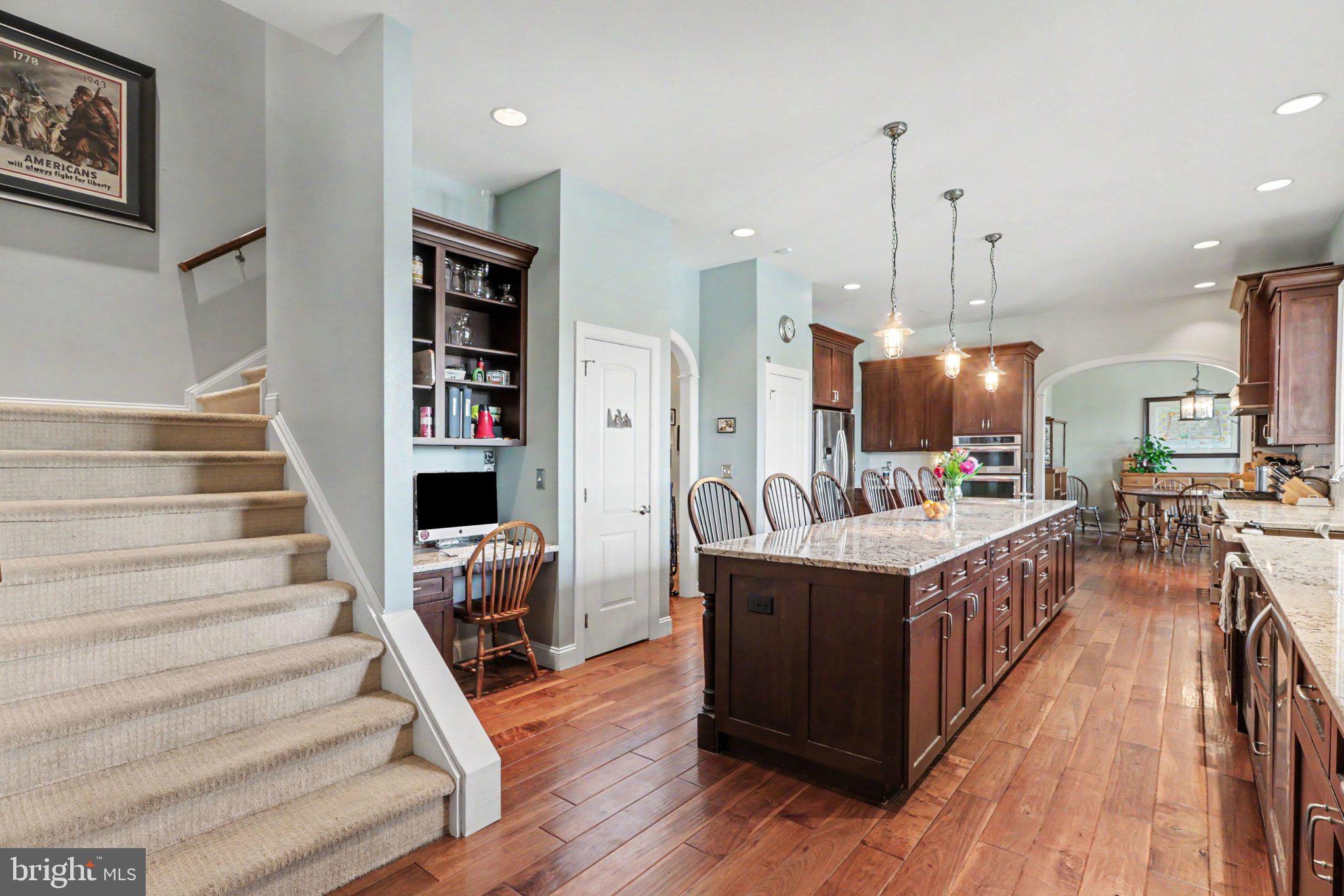 1080 Swatara Road Hershey, PA 17033 - Photo 6 of 59 a kitchen with stainless steel appliances granite countertop a stove and a wooden floors
