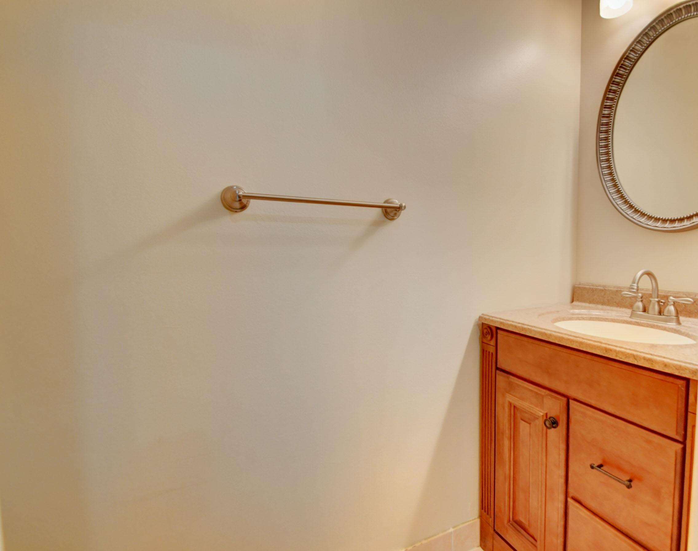 10620 Lake Jasmine Drive Boca Raton, FL 33498 - Photo 16 of 41 a bathroom with a sink and a mirror