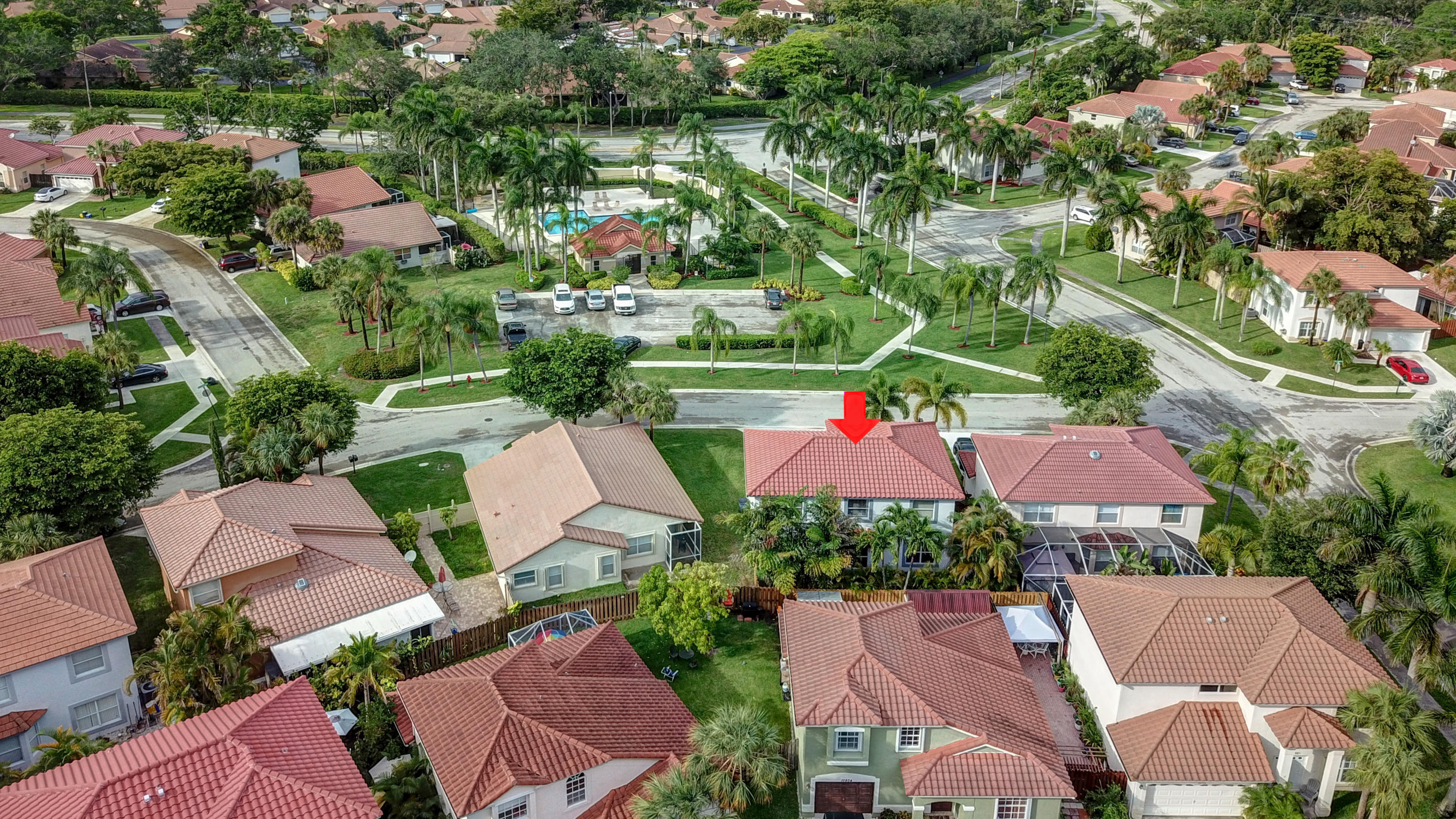 10620 Lake Jasmine Drive Boca Raton, FL 33498 - Photo 33 of 41 an aerial view of house with swimming pool outdoor seating and yard