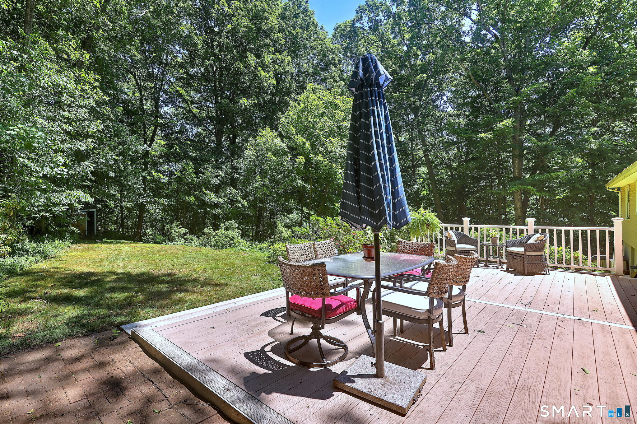 25 Mountain View Road Bethany, CT 06524 - Photo 3 of 27 Wonderful ground level deck and perfectly sized yard to manage.