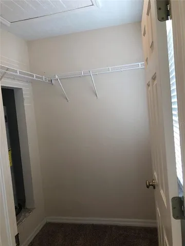 a view of small space with racks on the wall