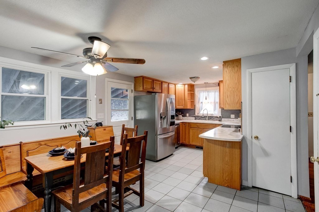 29 Basse Circle Lynn, MA 01905 - Photo 15 of 32 a large kitchen with a table and chairs