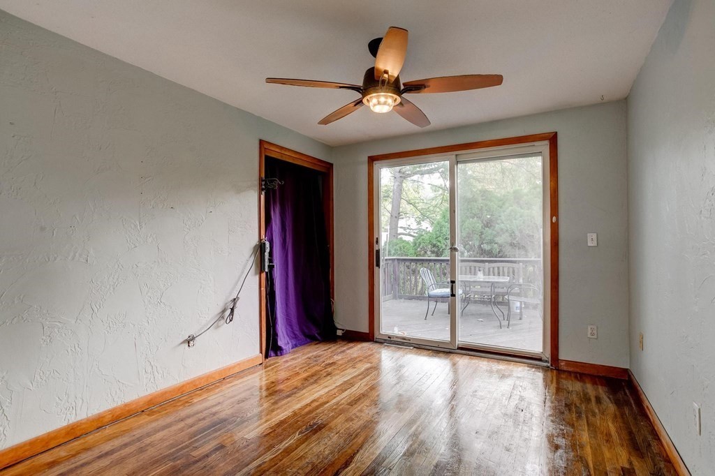 29 Basse Circle Lynn, MA 01905 - Photo 22 of 32 a view of empty room with wooden floor and fan