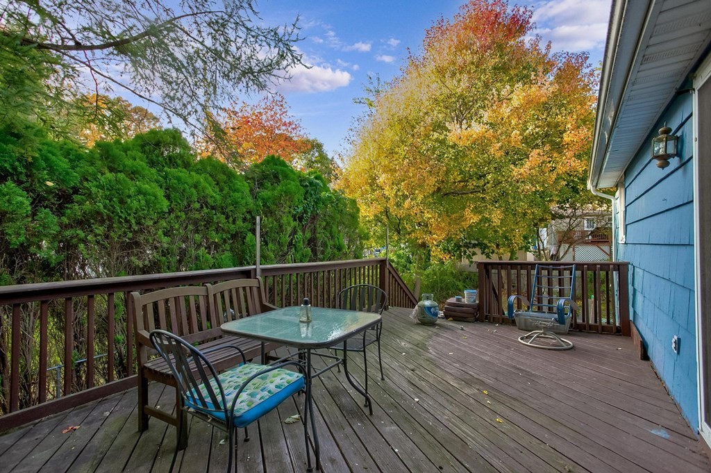 29 Basse Circle Lynn, MA 01905 - Photo 8 of 32 a view of a chairs on wooden deck