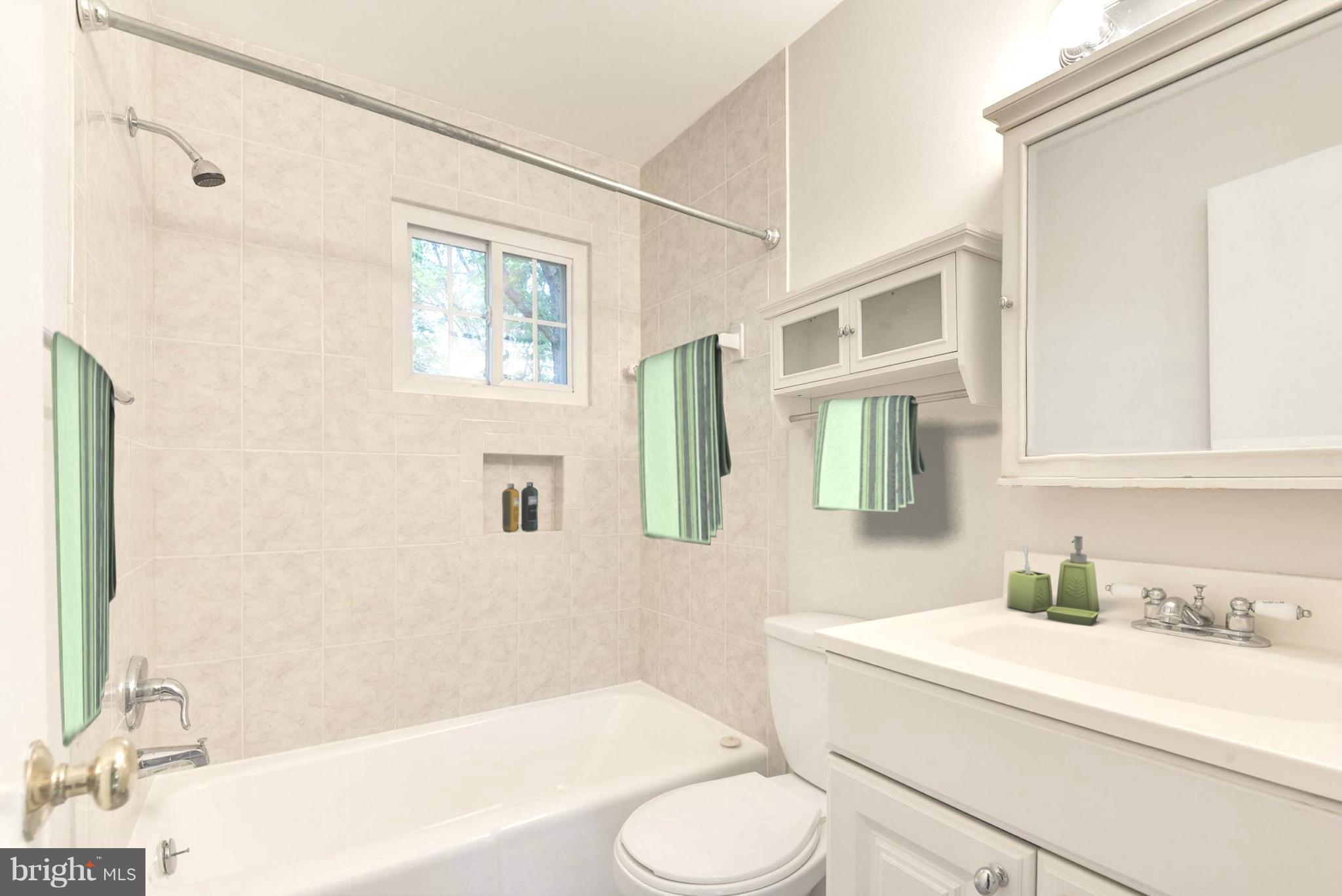 6732 Huntsman Boulevard Springfield, VA 22152 - Photo 16 of 23 a bathroom with a sink toilet and shower