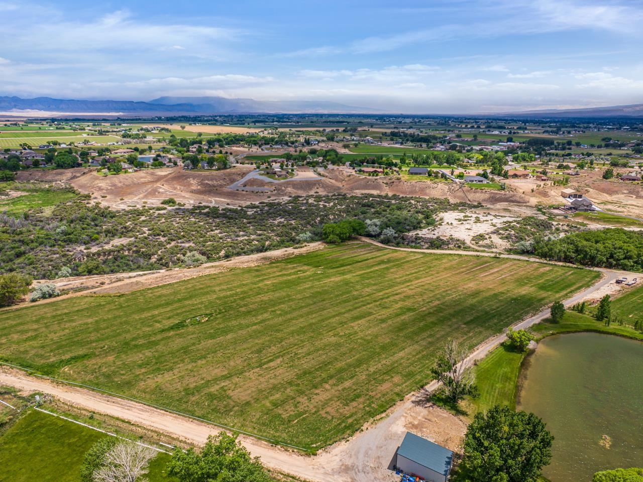 1810 M 3/4 Road Fruita, CO 81521 - Photo 7 of 15 a view of an ocean and beach