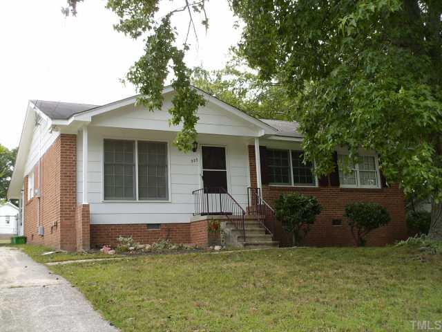 923 Edison Road Raleigh, NC 27610 - Photo 1 of 12 a house that has a tree in front of it