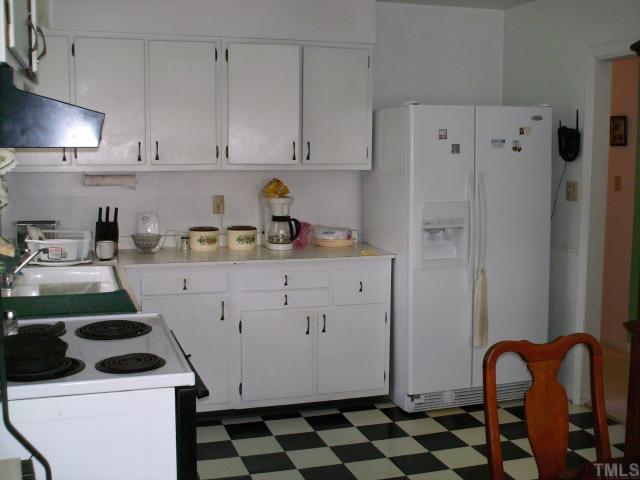 923 Edison Road Raleigh, NC 27610 - Photo 6 of 12 a kitchen with sink and cabinets