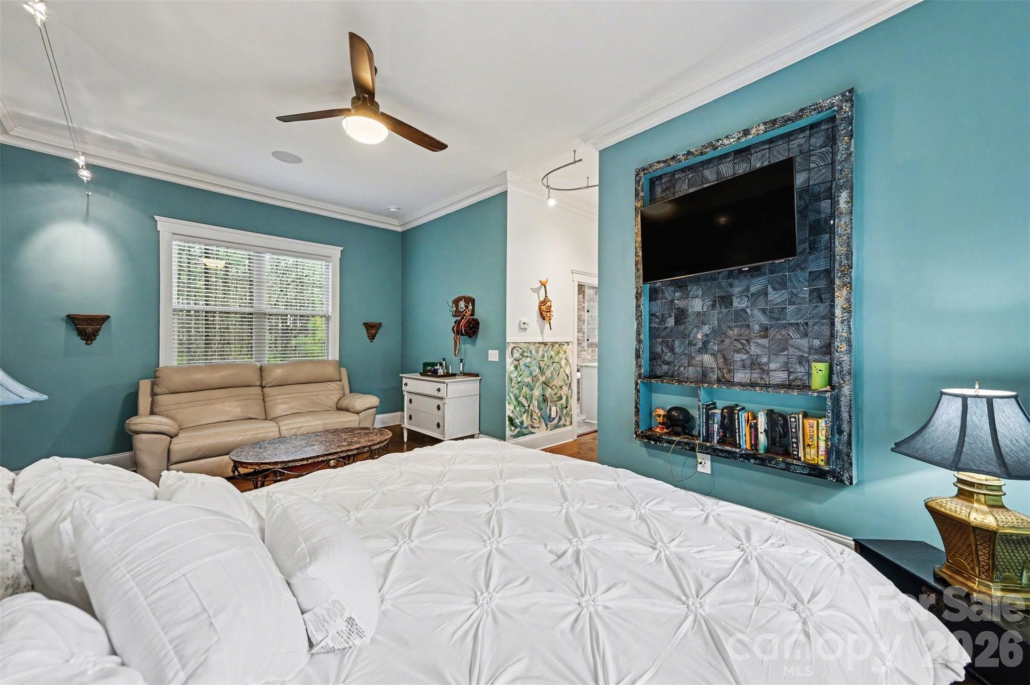 6302 Chimney Bluff Road Lancaster, SC 29720 - Photo 19 of 47 a bedroom with a bed and a fireplace