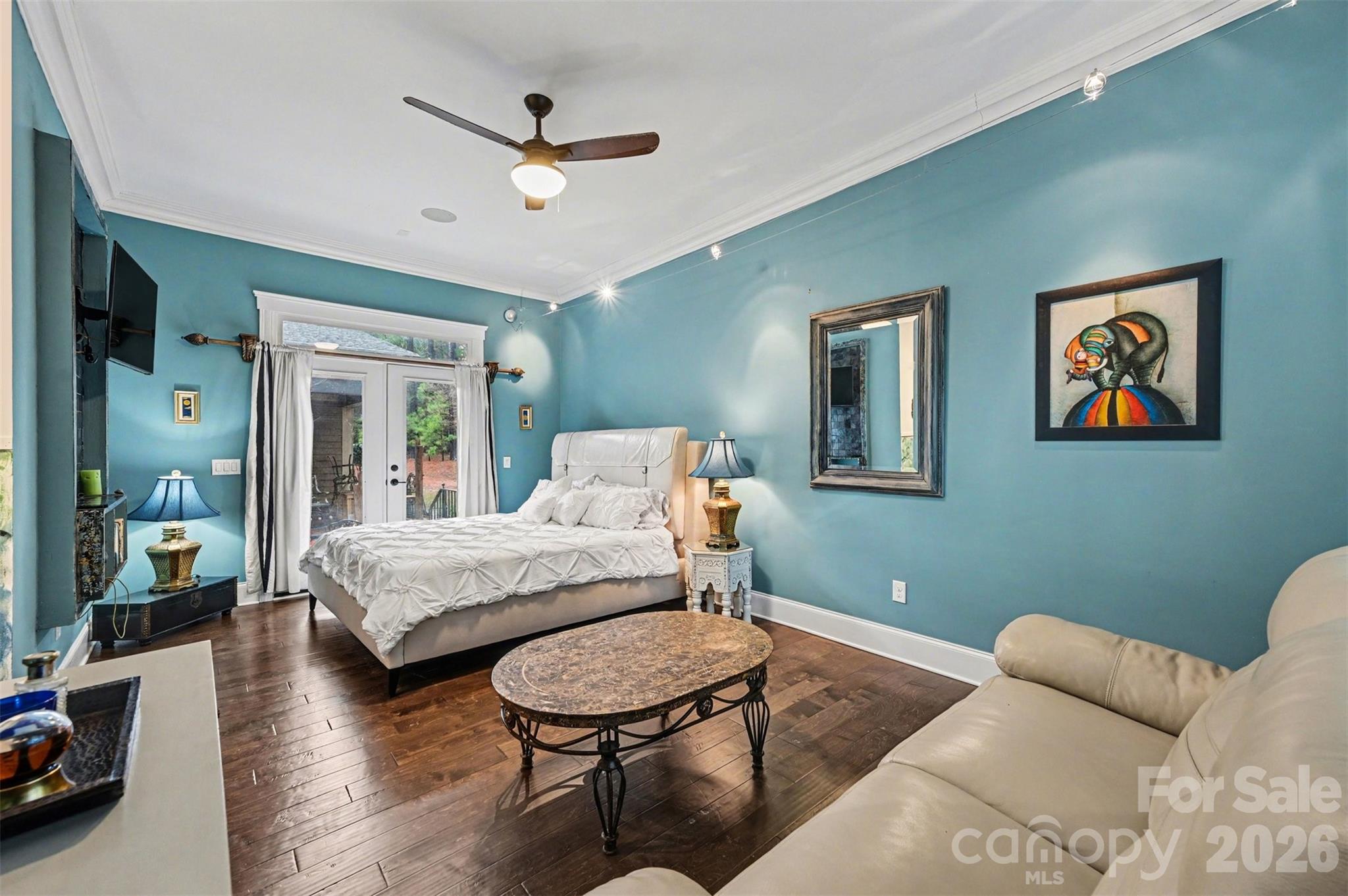 6302 Chimney Bluff Road Lancaster, SC 29720 - Photo 20 of 47 a bedroom with a bed and wooden floor
