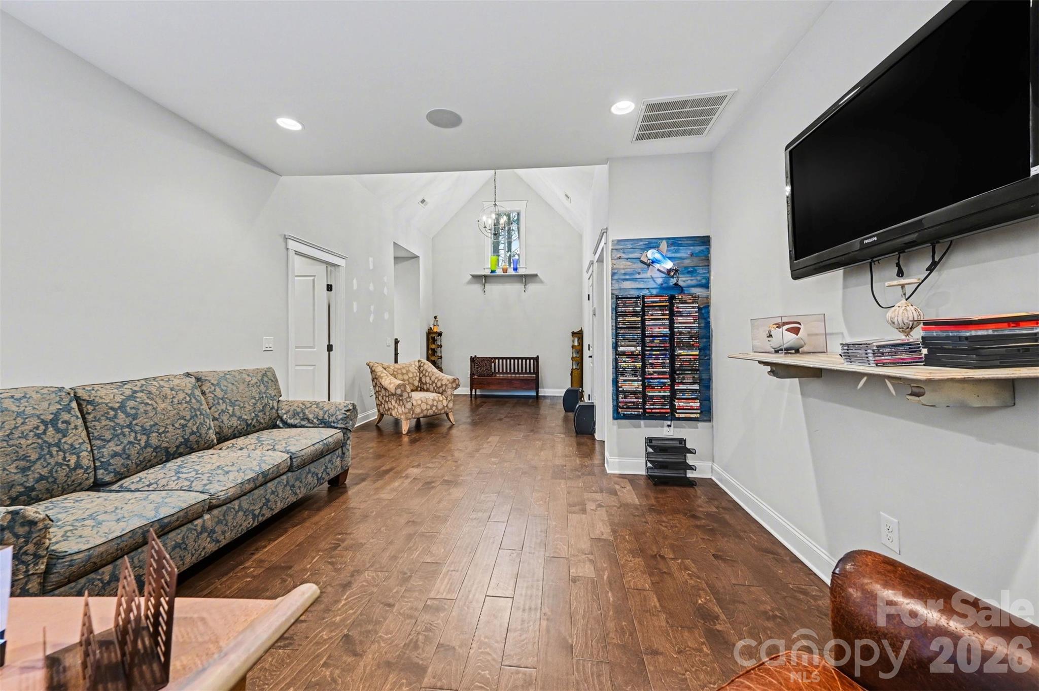 6302 Chimney Bluff Road Lancaster, SC 29720 - Photo 25 of 47 a living room with furniture and a flat screen tv