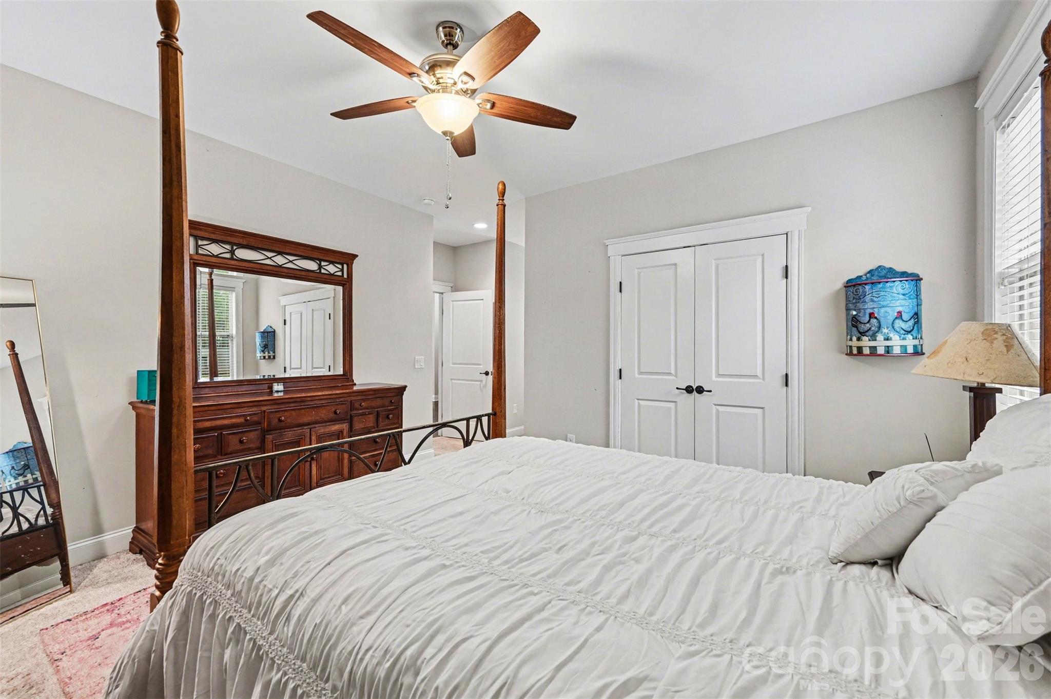 6302 Chimney Bluff Road Lancaster, SC 29720 - Photo 27 of 47 a bedroom with a bed and wooden floor