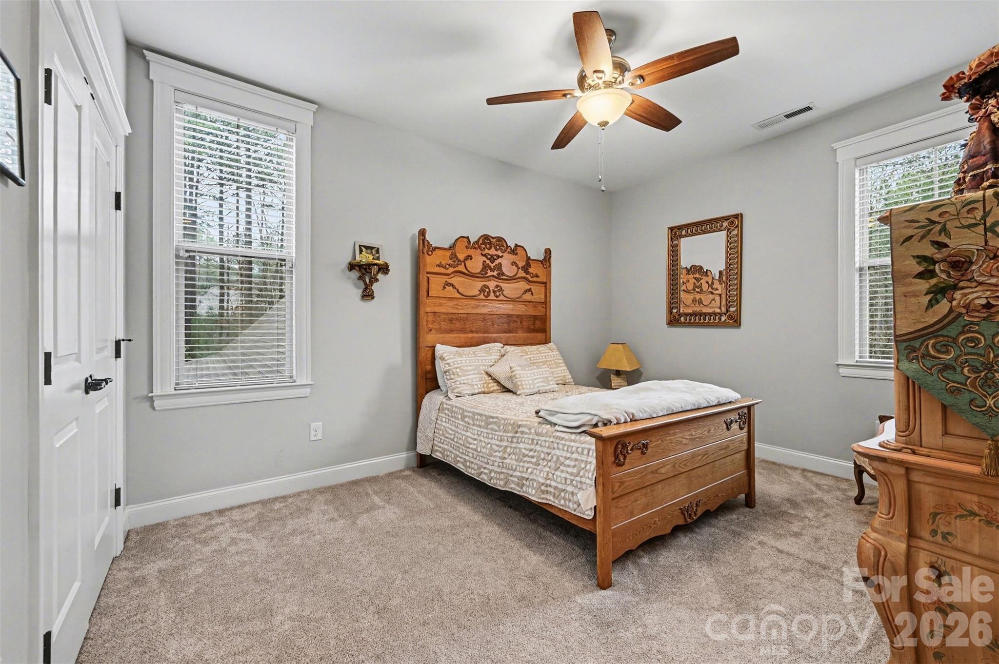 6302 Chimney Bluff Road Lancaster, SC 29720 - Photo 29 of 47 a living room with a bed furniture and a window