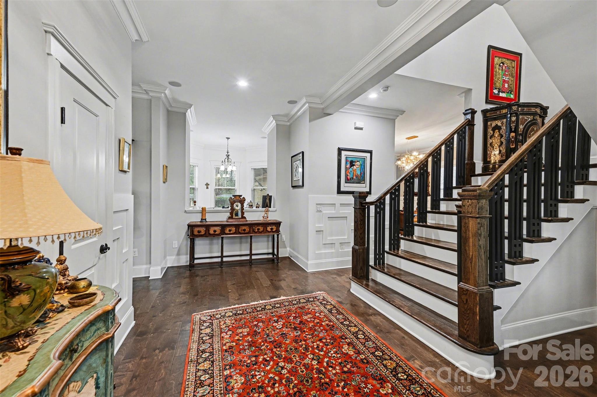 6302 Chimney Bluff Road Lancaster, SC 29720 - Photo 3 of 47 a view of a hallway with wooden floor and a livingroom