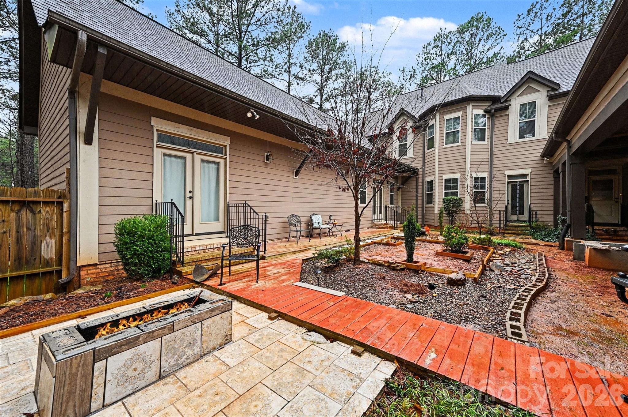 6302 Chimney Bluff Road Lancaster, SC 29720 - Photo 33 of 47 a view of a house with backyard