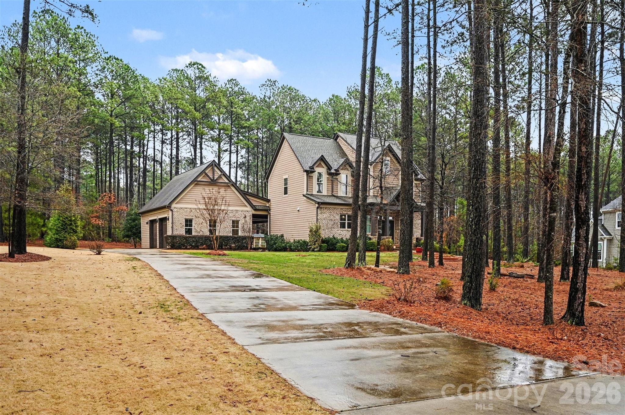 6302 Chimney Bluff Road Lancaster, SC 29720 - Photo 37 of 47 a front view of a house with a yard and trees
