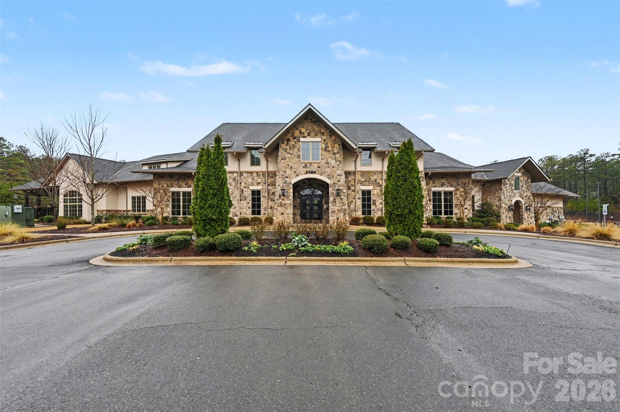 6302 Chimney Bluff Road Lancaster, SC 29720 - Photo 40 of 47 front view of a house with a yard