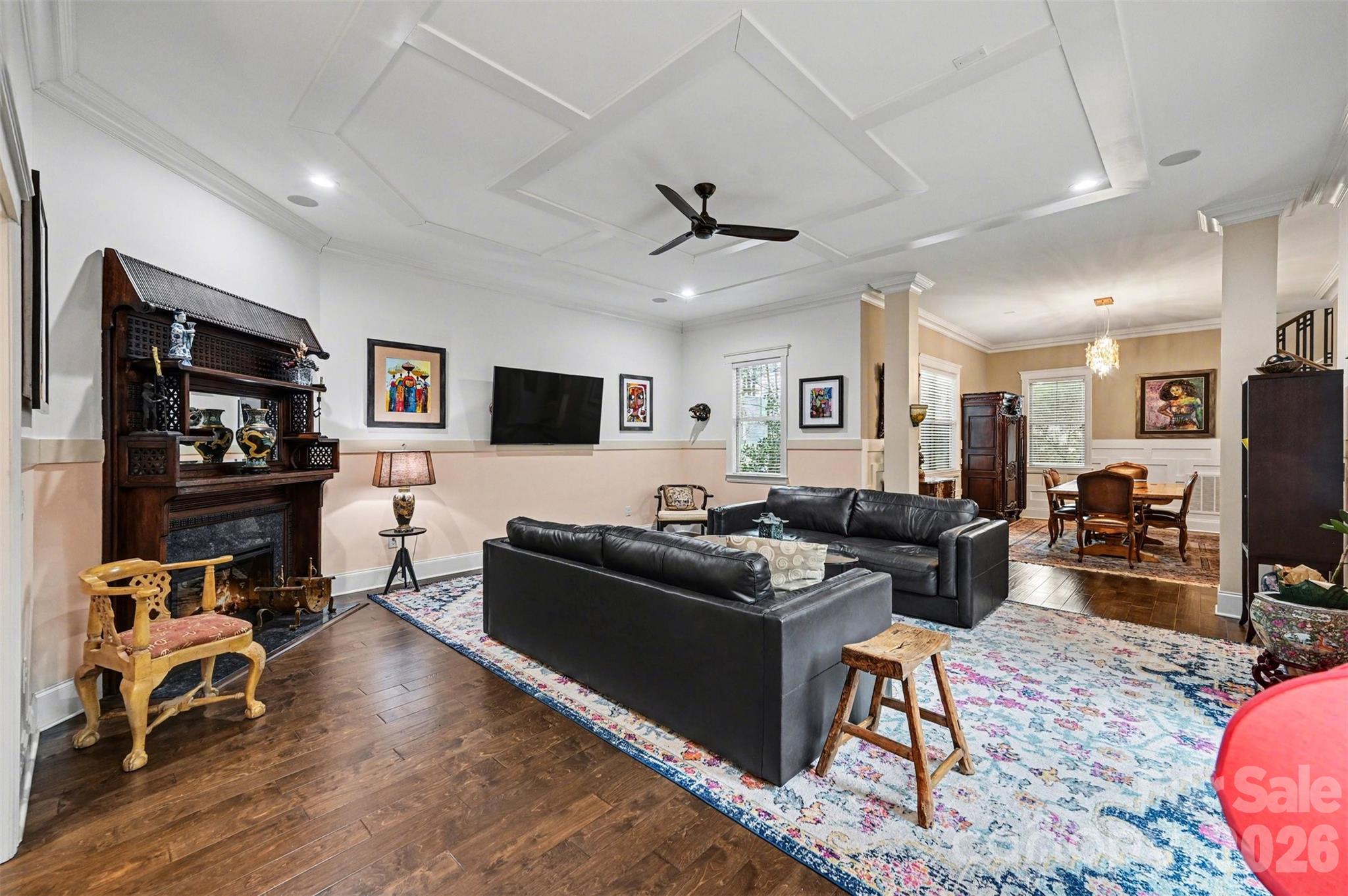 6302 Chimney Bluff Road Lancaster, SC 29720 - Photo 7 of 47 a living room with furniture flat screen tv and wooden floor