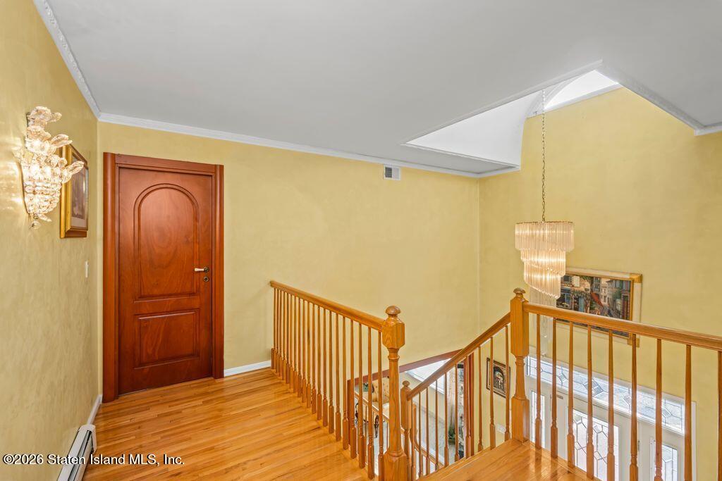 5 Rigimar Court Staten Island, NY 10309 - Photo 15 of 37 a view of a hallway with wooden floor