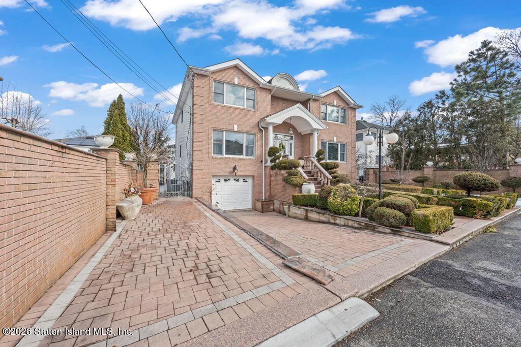 5 Rigimar Court Staten Island, NY 10309 - Photo 2 of 37 a front view of a house with a yard