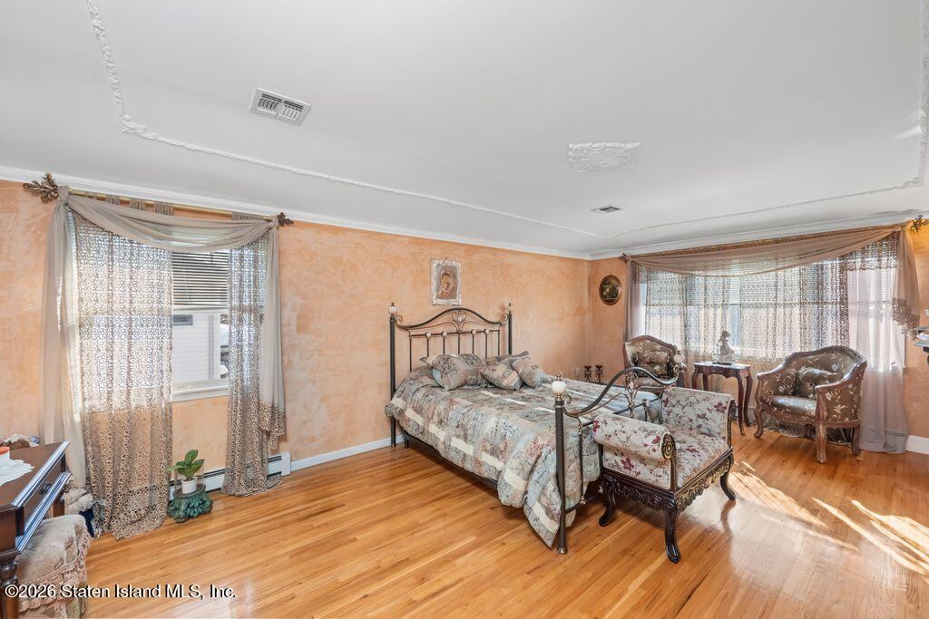 5 Rigimar Court Staten Island, NY 10309 - Photo 23 of 37 a bedroom with furniture and a window