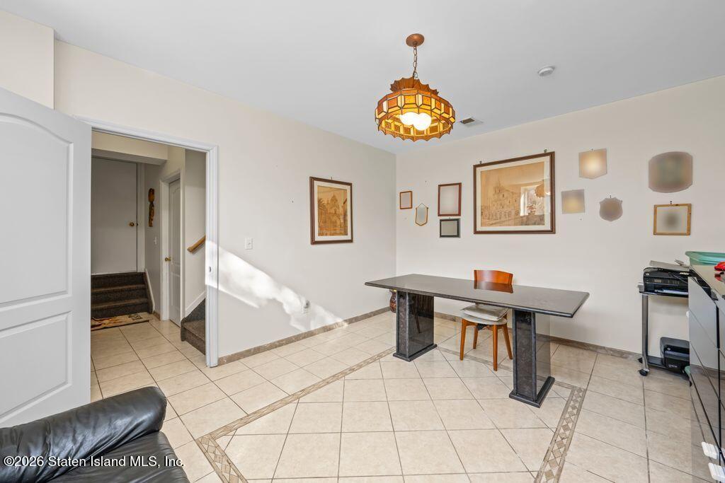 5 Rigimar Court Staten Island, NY 10309 - Photo 26 of 37 a view of a livingroom with furniture and a window