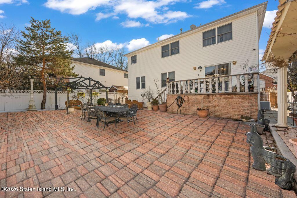 5 Rigimar Court Staten Island, NY 10309 - Photo 27 of 37 a view of a terrace with sitting area