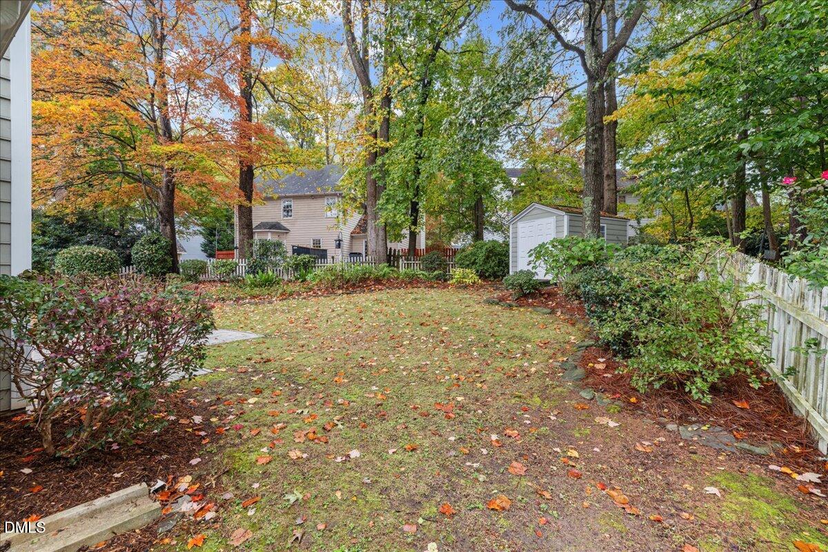 12436 Harcourt Drive Raleigh, NC 27613 - Photo 23 of 29 a view of a house with a yard