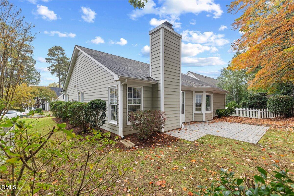 12436 Harcourt Drive Raleigh, NC 27613 - Photo 24 of 29 a view of a house with backyard and sitting area